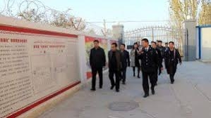Chinese Officials attending opening ceremony of new Internment camp in the region