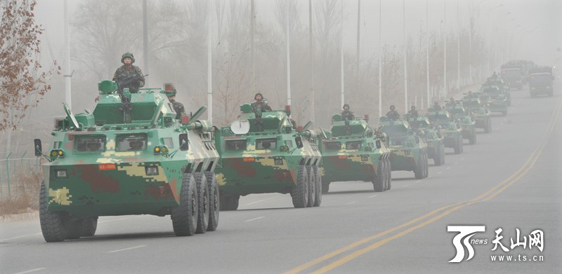 The government of the restive far-western Xinjiang marched thousands of armed officers through the region's southern city of Kashgar in a shock and awe campaign against what it says is the rising threat of terrorism and ethnic separatism. 2017-02-17