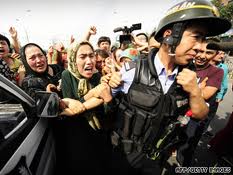 Uyghur women protesting during the July 2009 Urumqi unrest