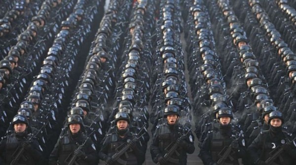 China's People's Armed Police strike fear in Xinjiang. (Photo : Xinhua)   