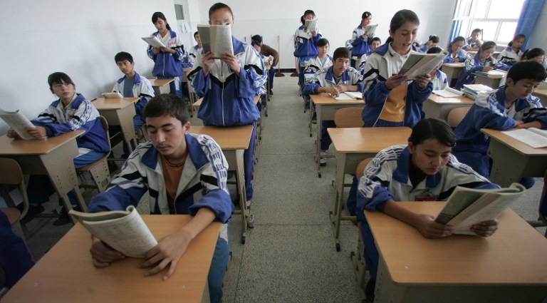 Uyghur students study at a bilingual middle school in Hotan, Xinjiang, in a file photo.