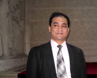 Ilham Tohti in France, February 2009.