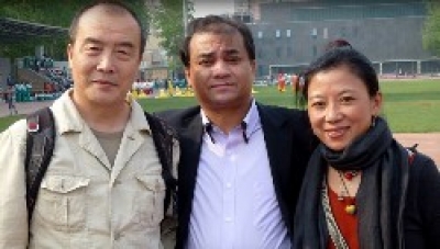 Prof. Ilham Tohti (centre) with Tsering Woser and Wang Lixiong