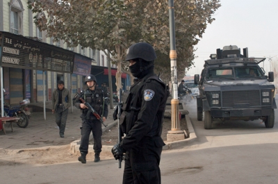 Security forces have a heavy presence in China's far-west Xinjiang province [Andrey Kovalenko/Al Jazeera]