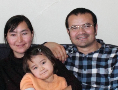 Abduweli Ayup (R) with his wife and daughter while studying in the U.S. in 2010.