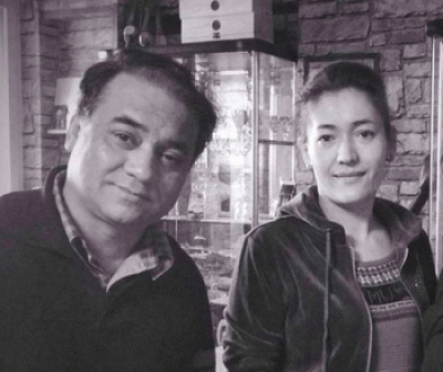 Ilham Tohti with his wife Guzelur